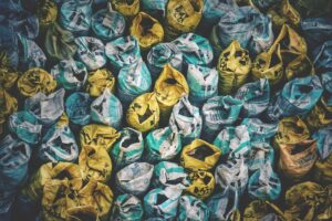 top-down view of multicolored sacks full of waste